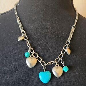 Heart Necklace silver in color and turquoise in color